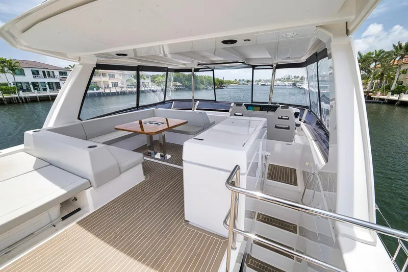 Slide: The Image of Luxurious interior of 2024 Leopard 46 Powercat yacht with spacious seating and scenic water views. - 43