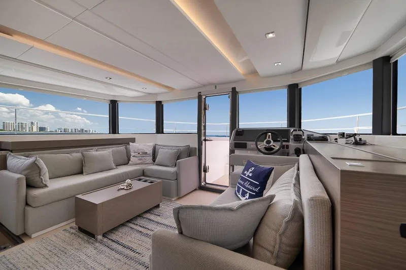 Slide: The Image of Luxurious interior of 2024 Leopard 46 Powercat yacht with modern seating and panoramic windows. - 50