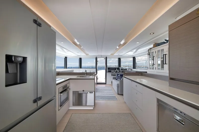 Slide: The Image of Luxurious interior of 2024 Leopard 46 Powercat yacht with modern kitchen and ocean view. - 54