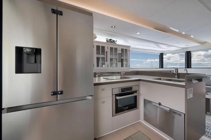 Slide: The Image of Modern kitchen interior on 2024 Leopard 46 Powercat yacht with stainless steel appliances. - 55