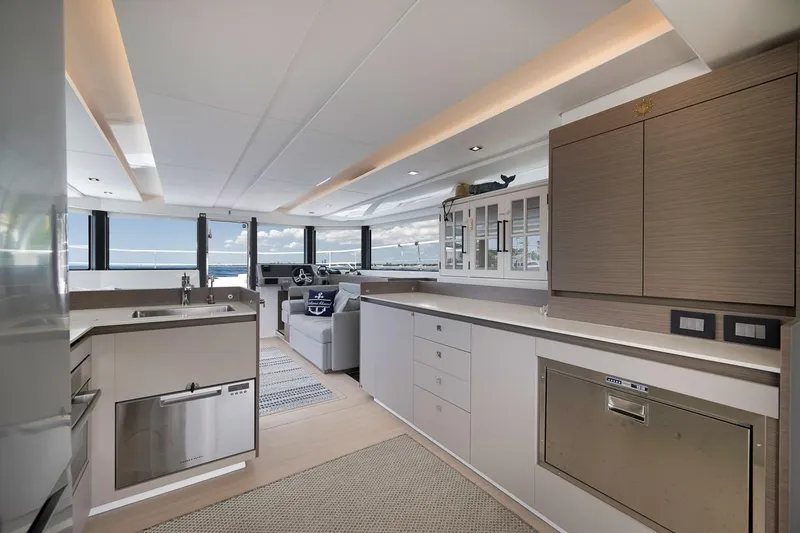Slide: The Image of Luxurious interior of 2024 Leopard 46 Powercat yacht with modern kitchen and panoramic windows. - 57