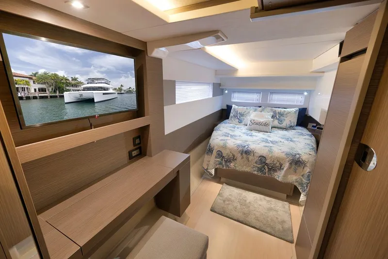 Slide: The Image of Luxurious interior of 2024 Leopard 46 Powercat with cozy bedroom and scenic view. - 61