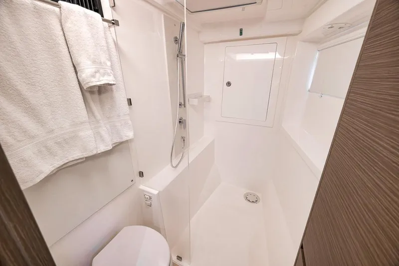 Slide: The Image of Modern bathroom in 2024 Leopard 46 Powercat yacht, featuring sleek shower and white towels. - 66