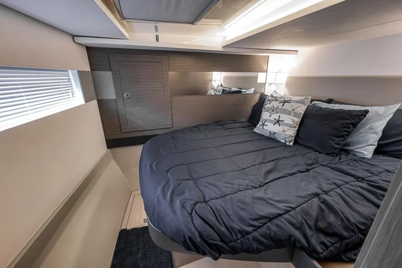Slide: The Image of Luxurious bedroom interior of 2024 Leopard 46 Powercat with cozy bedding and modern design. - 72