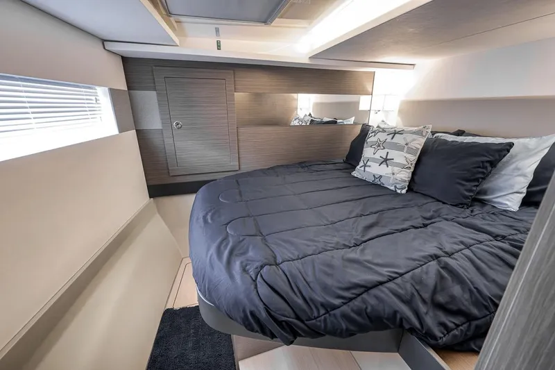 Slide: The Image of Luxurious bedroom interior of 2024 Leopard 46 Powercat with modern design and cozy bedding. - 73