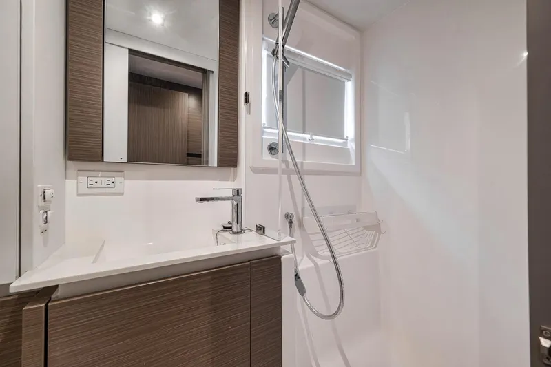 Slide: The Image of Modern bathroom interior of 2024 Leopard 46 Powercat yacht with sleek fixtures and mirror. - 74
