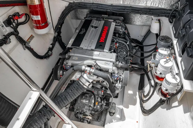 Slide: The Image of Engine room of 2024 Leopard 46 Powercat with Yanmar engine and fire extinguisher. - 76
