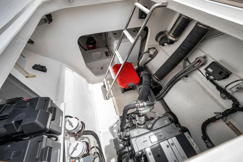 Slide: The Image of Engine room of 2024 Leopard 46 Powercat, showcasing mechanical components and storage. - 77