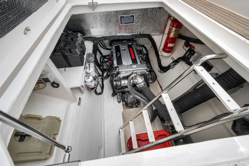 Slide: The Image of Engine room of 2024 Leopard 46 Powercat with modern equipment and fire extinguisher. - 79