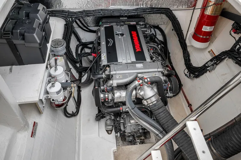 Slide: The Image of Engine room of 2024 Leopard 46 Powercat with Yanmar engine and fire extinguisher. - 81
