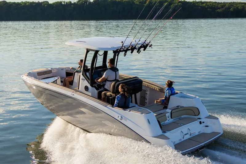 Slide: The Image of Yamaha 255 FSH Sport H 2026 on water with fishing rods. - 9