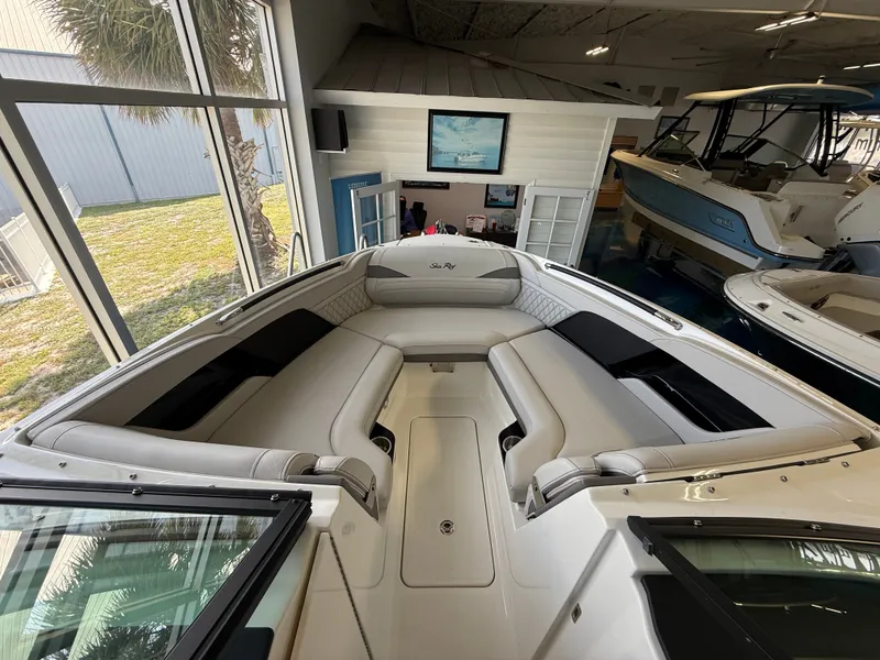 Slide: The Image of Interior view of the Sea Ray SLX 280 Outboard with sleek, cushioned seating and modern design. - 4