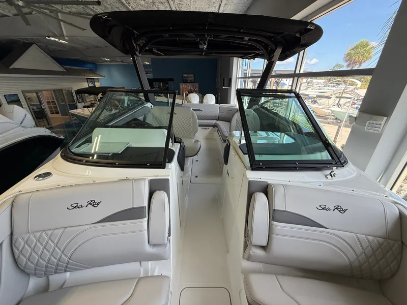 Slide: The Image of Interior view of a 2027 Sea Ray SLX 280 Outboard with luxurious seating and modern design. - 8