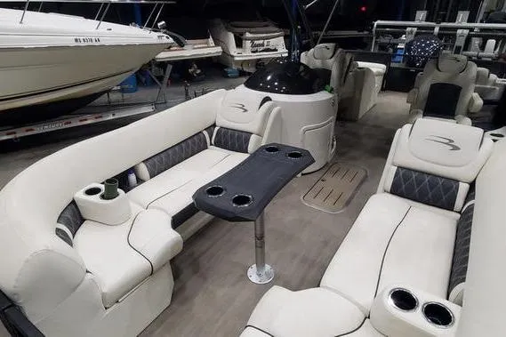 Slide: The Image of Luxurious 2018 Bennington 23 GCWA pontoon boat interior with plush seating and sleek design. - 12