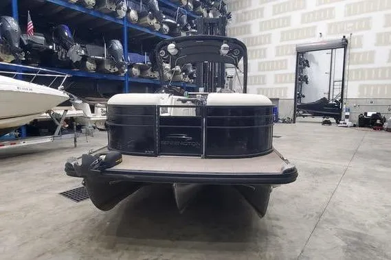 Slide: The Image of 2018 Bennington 23 GCWA pontoon boat in indoor storage facility. - 2