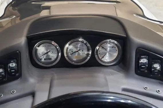 Slide: The Image of Dashboard of a 2018 Bennington 23 GCWA boat with gauges and controls. - 8