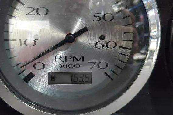 Slide: The Image of Close-up of a 2018 Bennington 23 GCWA tachometer showing 163.6 RPM x100. - 9