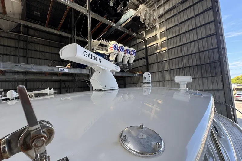 Slide: The Image of 2006 Intrepid 377 Walkaround with Garmin radar in a storage facility. - 17