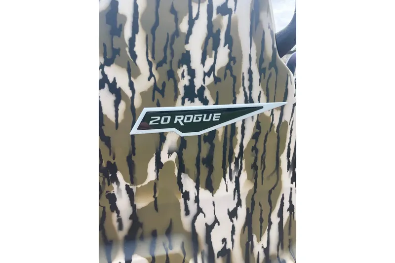 Slide: The Image of Camouflage design with "20 Rogue" logo on Avid 2026 model. - 14