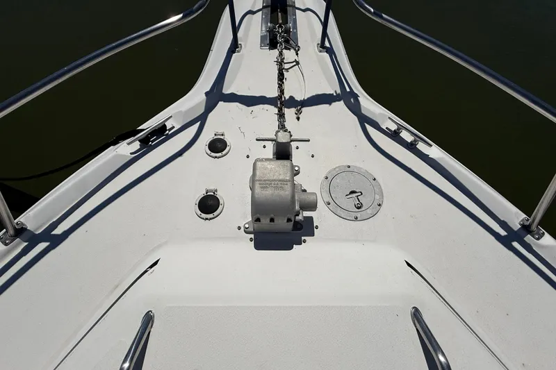 Slide: The Image of Bow of 1996 Sea Ray 400 Express Cruiser with anchor chain and deck fittings. - 4