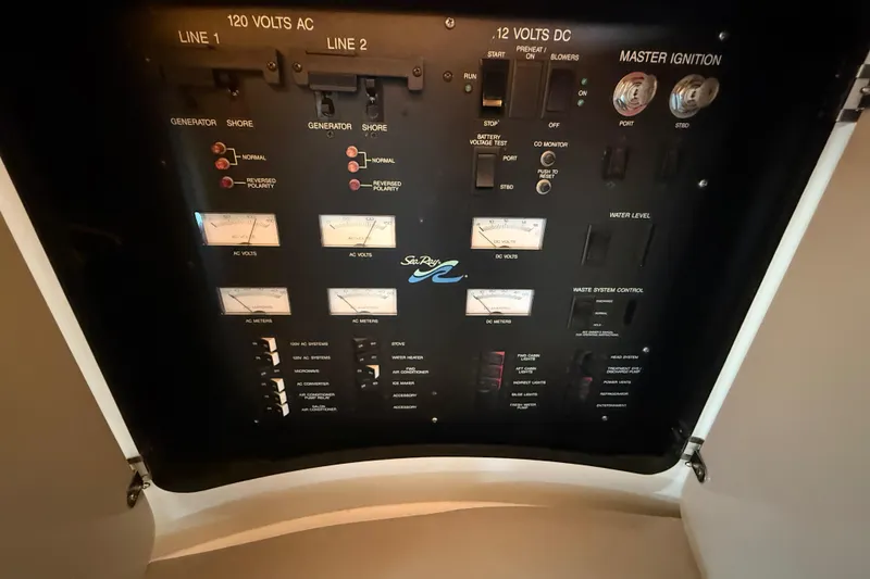 Slide: The Image of Electrical control panel of a 1996 Sea Ray 400 Express Cruiser boat. - 55