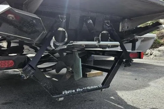 Slide: The Image of Rear view of 2017 MasterCraft NXT20 boat propeller and trailer setup. - 4