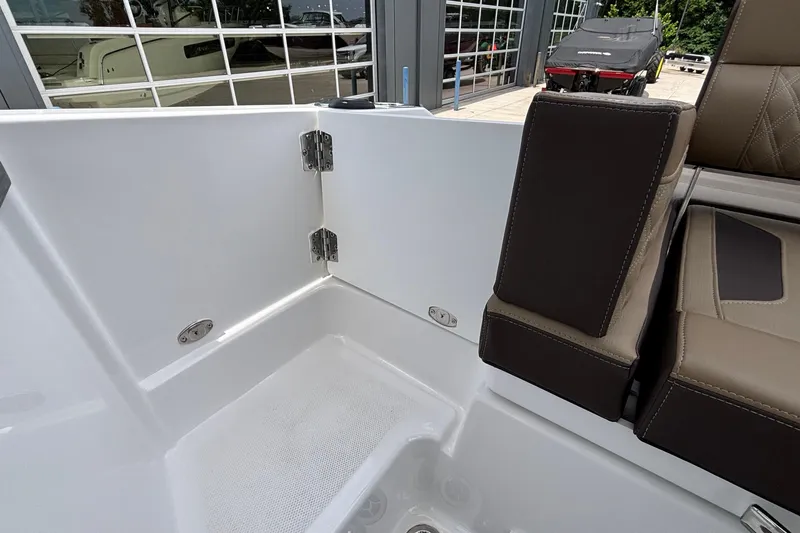 Slide: The Image of Interior view of 2026 Monterey Elite 27 OB boat, featuring sleek seating and modern design. - 21