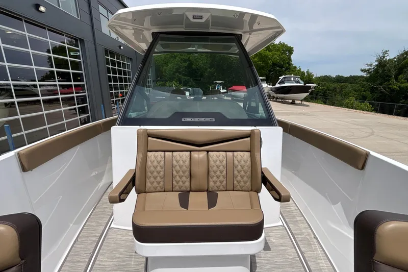 Slide: The Image of 2026 Monterey Elite 27 OB boat interior with luxurious seating and modern design. - 40