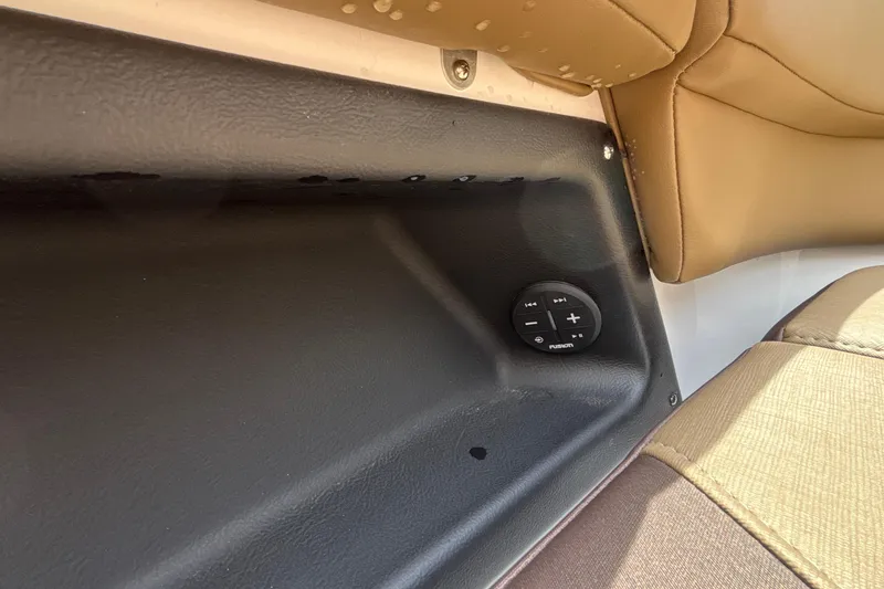 Slide: The Image of Interior of 2026 Monterey Elite 27 OB boat with Fusion audio control panel. - 41
