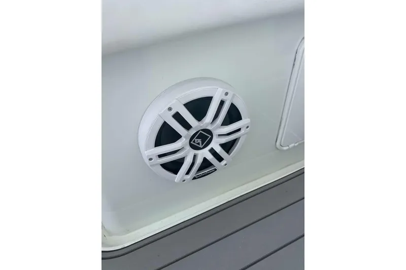 Slide: The Image of White speaker on a 2014 Yellowfin 42 Offshore boat deck. - 16
