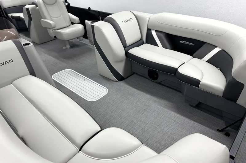 Slide: The Image of Luxurious interior of 2025 Sylvan Mirage X X5 pontoon boat with plush seating. - 10
