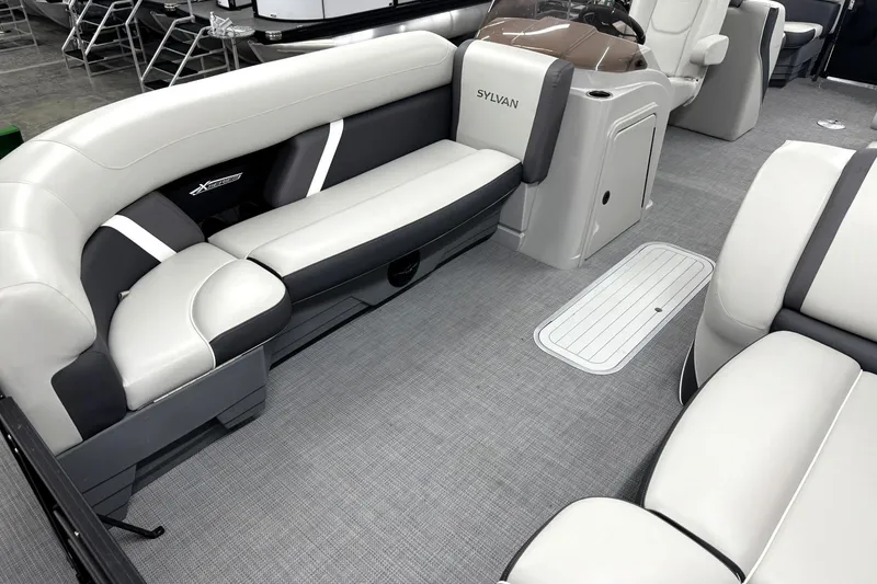 Slide: The Image of Interior of 2025 Sylvan Mirage X X5 pontoon boat with luxurious seating and modern design. - 11