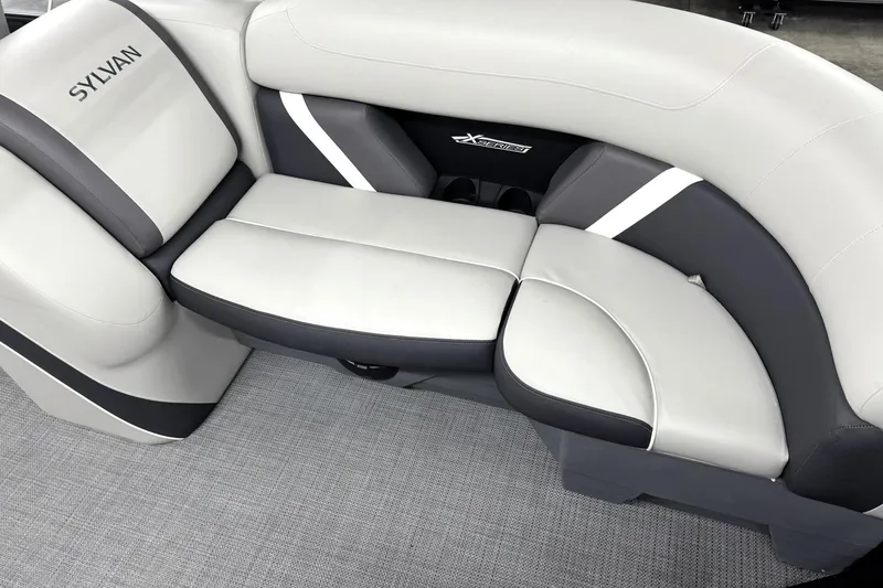 Slide: The Image of 2025 Sylvan Mirage X X5 boat interior with sleek, modern seating design. - 17
