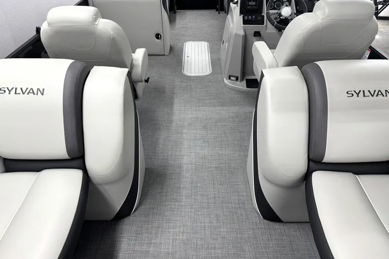 Slide: The Image of Interior of 2025 Sylvan Mirage X X5 boat with luxurious seating and modern design. - 18