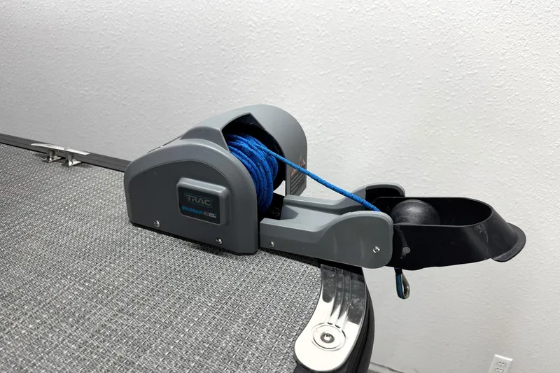 Slide: The Image of Electric anchor winch on Sylvan Mirage X X5 boat, 2025 model, with blue rope. - 6