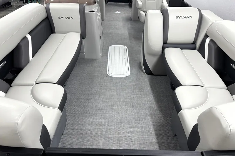 Slide: The Image of 2025 Sylvan Mirage X X5 boat interior with plush seating and modern design. - 9