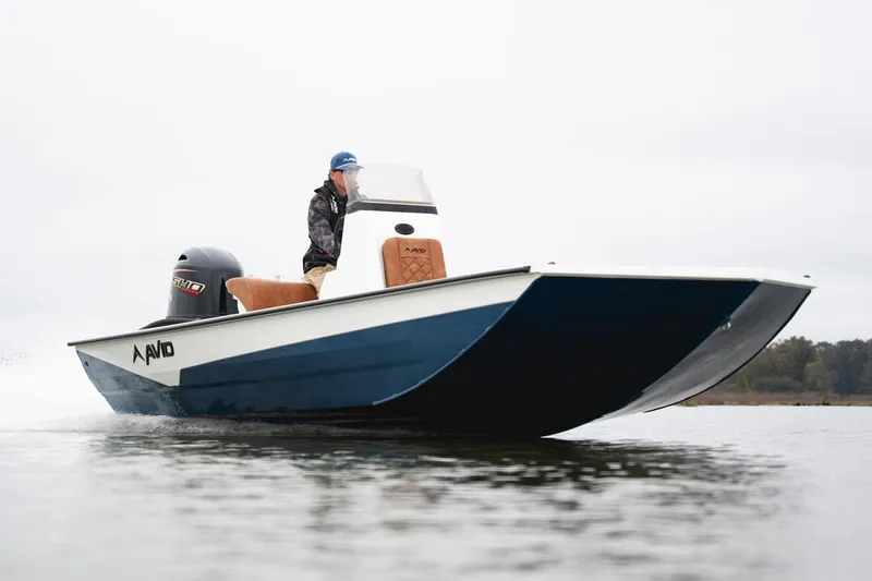 Slide: The Image of Manufacturer Provided Image: Avid 207 Recon 2026 boat cruising on water, featuring sleek design and powerful engine. - 24