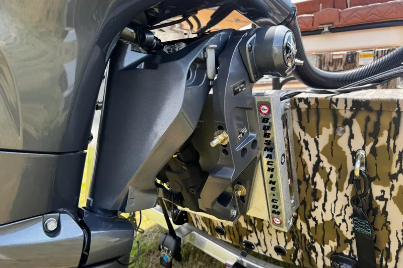 Slide: The Image of Close-up of Avid 207 Recon 2026 boat motor mount with camouflage pattern. - 8