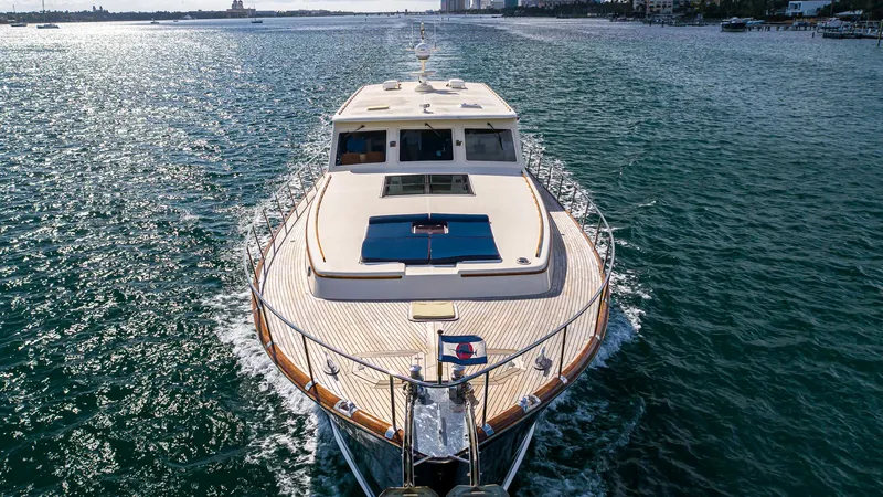 Slide: The Image of 2006 Vicem 85 Classic yacht cruising on open water, front view. - 11