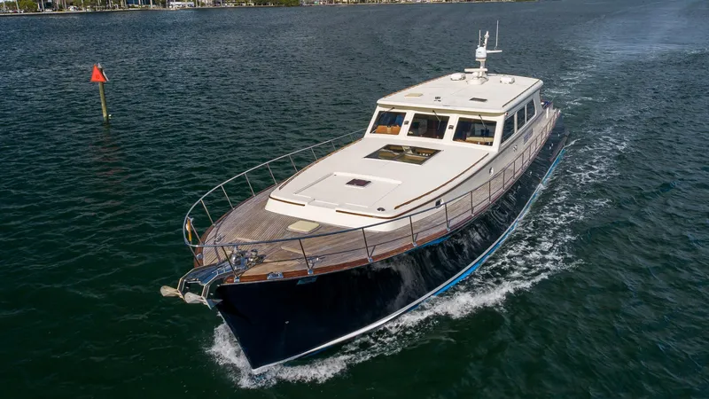 Slide: The Image of 2006 Vicem 85 Classic yacht cruising on open water. - 2
