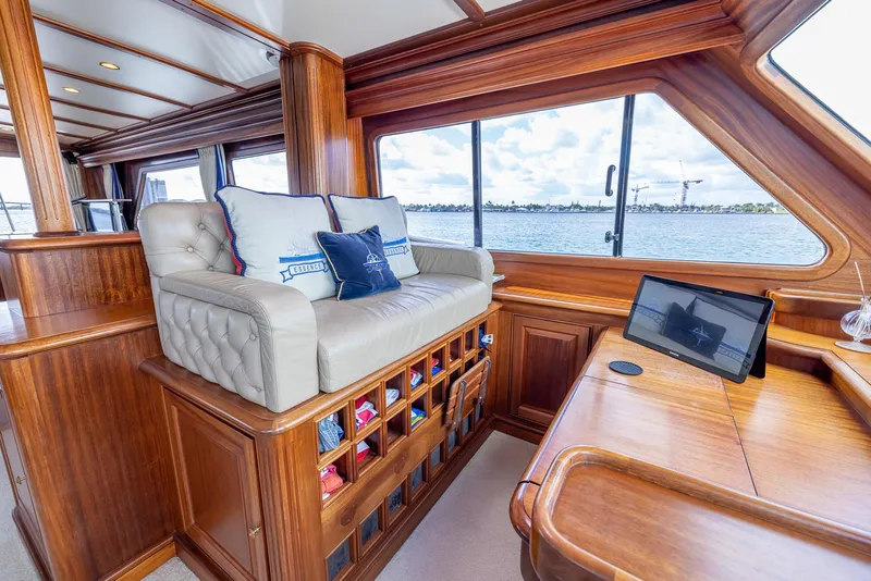 Slide: The Image of Luxurious interior of 2006 Vicem 85 Classic yacht with elegant wood finish and plush seating. - 30