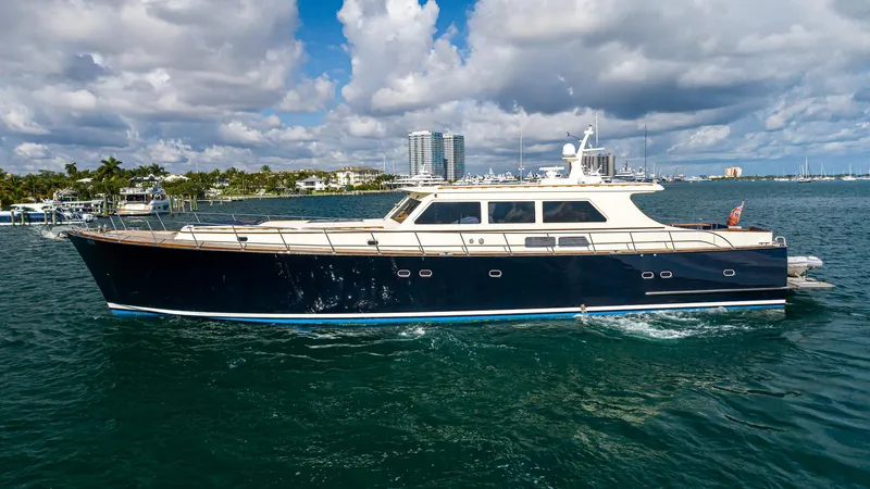 Slide: The Image of 2006 Vicem 85 Classic yacht cruising on a sunny day with cloudy skies. - 9
