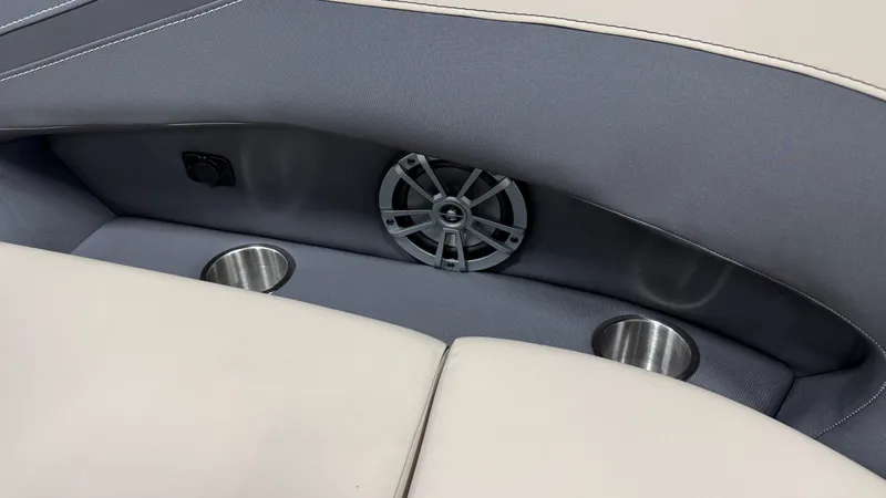 Slide: The Image of Close-up of a boat seat with speaker and cup holders. - 23
