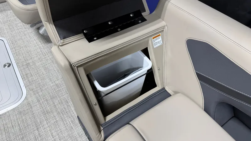 Slide: The Image of A sleek seating area with an integrated trash bin in a Barletta ARIA22UC boat. - 30