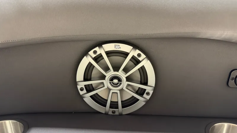 Slide: The Image of A speaker is integrated into the interior paneling of a boat. - 16