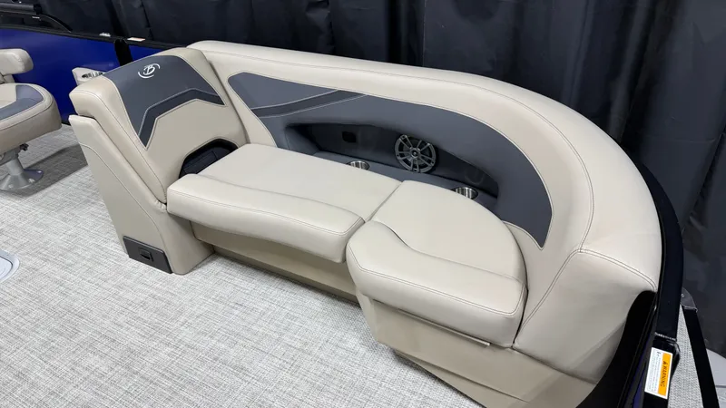 Slide: The Image of Elegant cream-colored seating with gray accents and speaker, installed on a boat. - 20