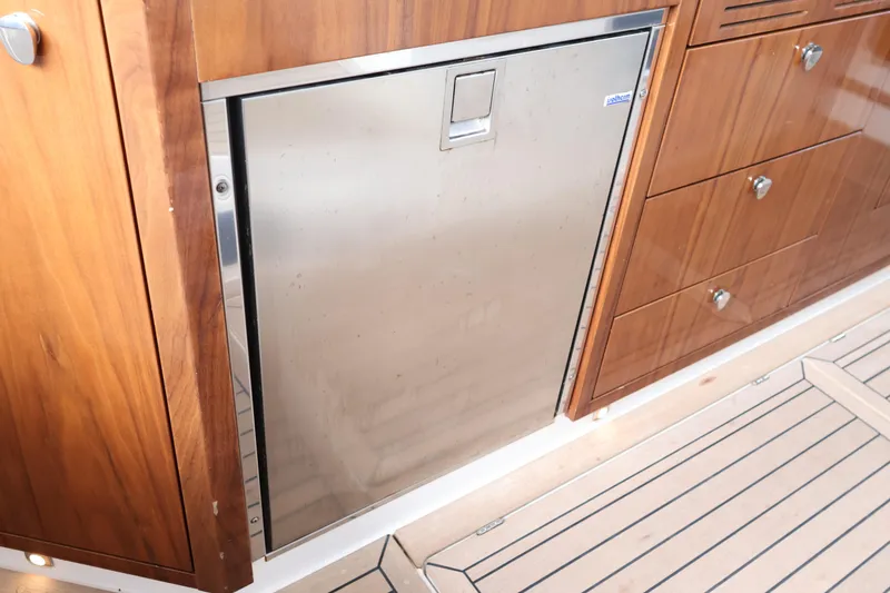 Slide: The Image of Stainless steel refrigerator in 2024 Aquador 300 HT yacht interior. - 28