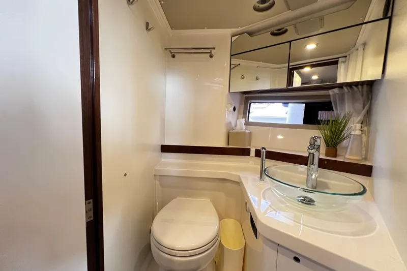 Slide: The Image of Modern bathroom in 2024 Aquador 300 HT yacht with glass sink and sleek design. - 54