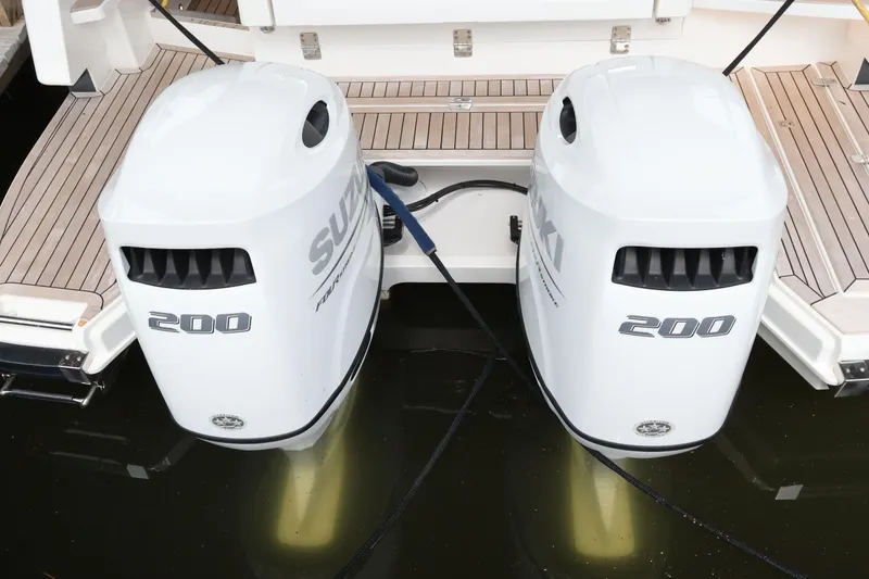 Slide: The Image of Twin Suzuki 200 outboard engines on 2024 Aquador 300 HT boat. - 65