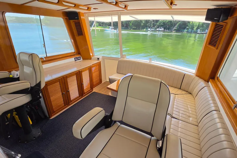 Slide: The Image of Luxurious interior of 2003 Grand Banks 49 Eastbay HX yacht with scenic water view. - 22